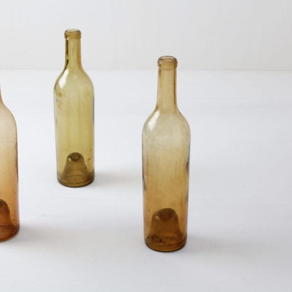 Vintage wine bottles, glassware, vases & wedding decoration