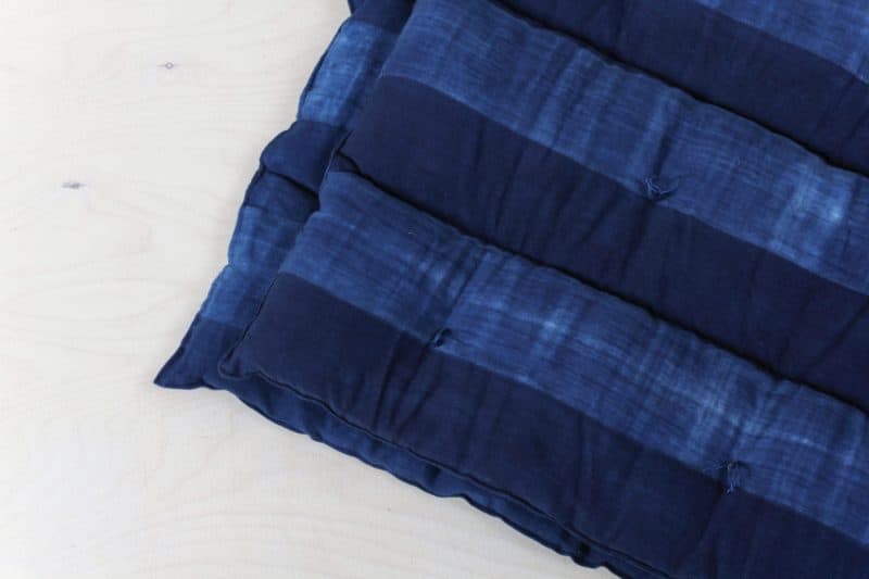  | The Veto cotton mattress is from Guinea. The mattress is hand woven and hand dyed in indigo blue. The Indigo mattress is perfect for decorating lounge, picnic and garden parties.Matching the Veto mattress we rent the Veto Vicente and other pillows and blankets. | 