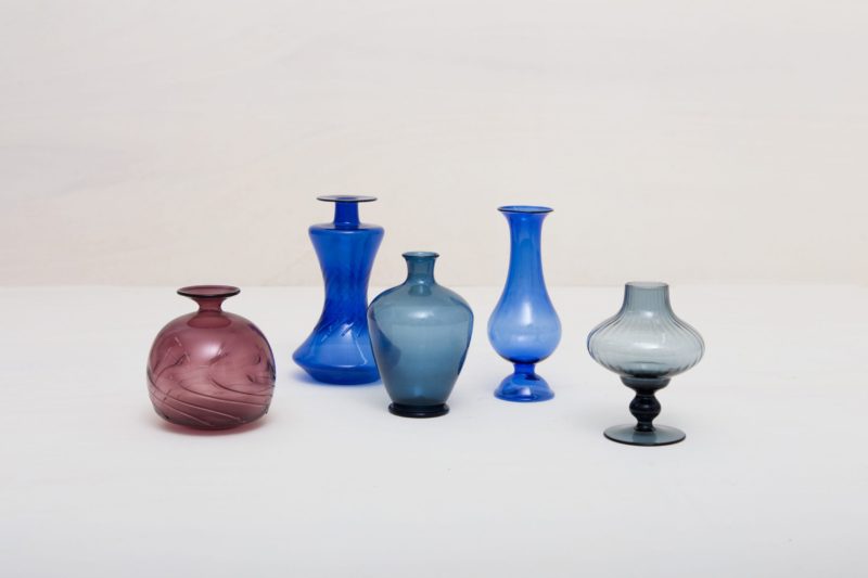  | These vintage mouth blown glass vases shine in a variety of colors and shapes. Whether individually or as an ensemble, they put small flower arrangements perfectly in scene. | 