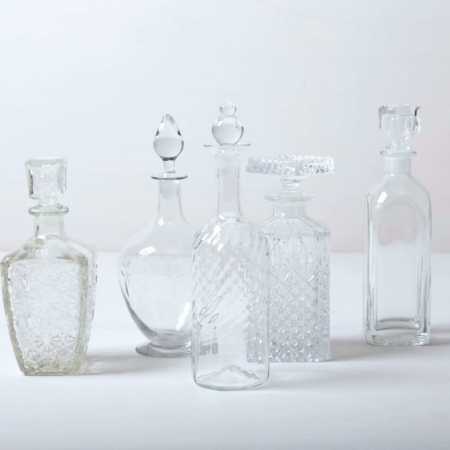 Vintage liqueur and whiskey bottles, crystal glass