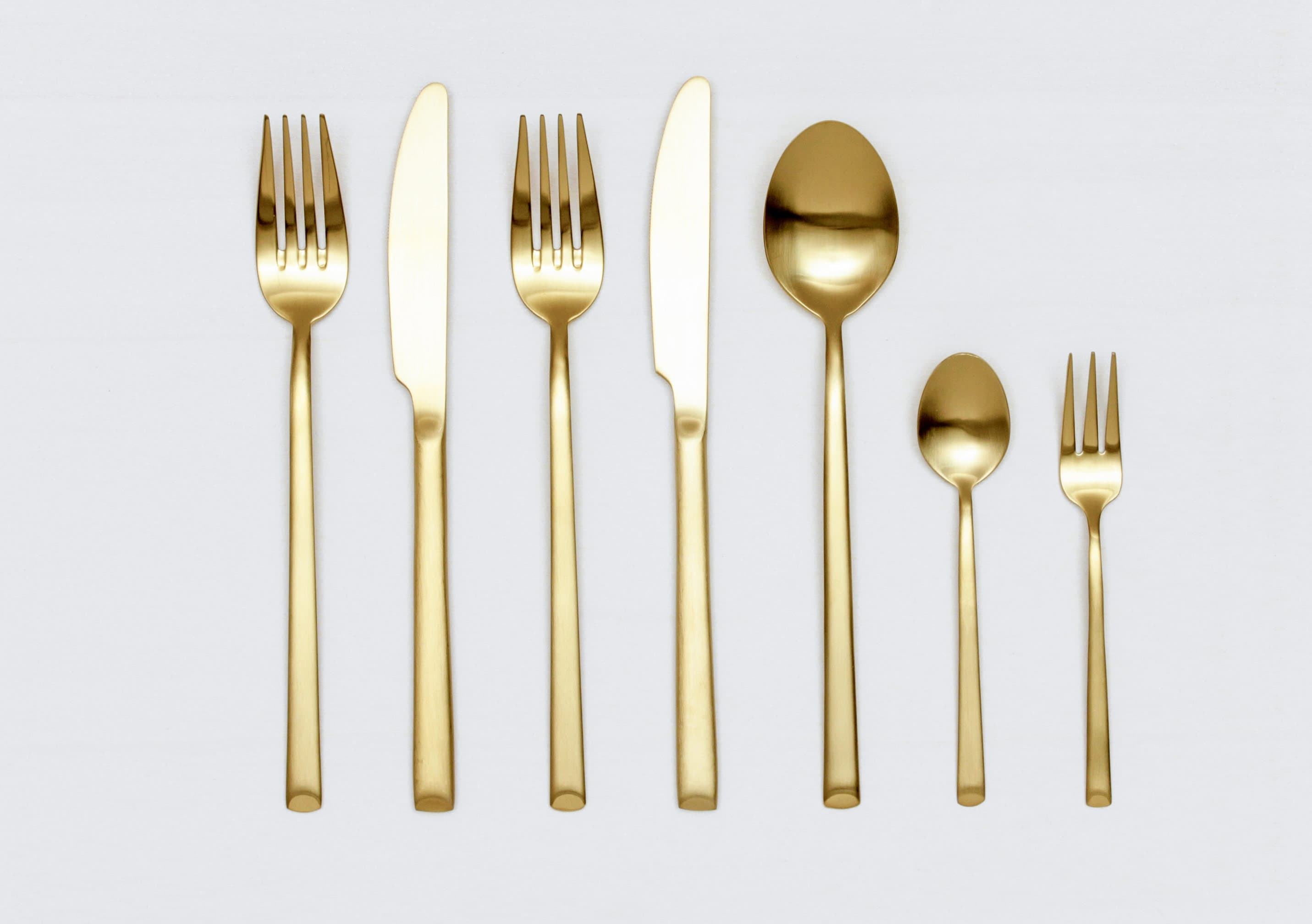seven piece gold cutlery set