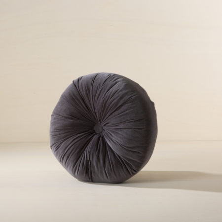 Pillow Amaicha Grey Round 40cm | Are you looking to add a bit of Hollywood Glamour to your lounging area? These round draped pillows look exactly as if they come right from the villa of a 1940s movie star. The dark grey velvet gives them a very sophisticated lustre that matches perfectly with many patterns and colours. And they are very comfy, too! | gotvintage Rental & Event Design