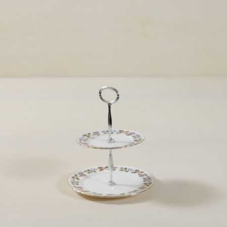 Cake Stand Rosales | Rosales is a two-tiered vintage cake stand with a beautiful flower pattern. Equipped with two classy plates, on each of which the same pattern can be found, cake stand Rosales adorns every cake table with her enchanting elegance.  

You can rent a wide range of two- and three-tiered cake stands from us or put together individual cake stand sets or have them put together for you. | gotvintage Rental & Event Design